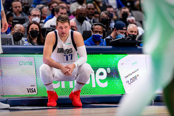 Luka Doncic crouching red shoes